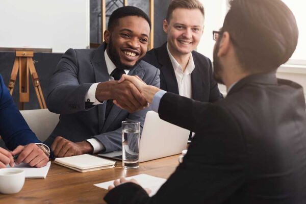 ReFrame-Disclosure-People-Across-Desk-Shaking-Hands-Blog-Header