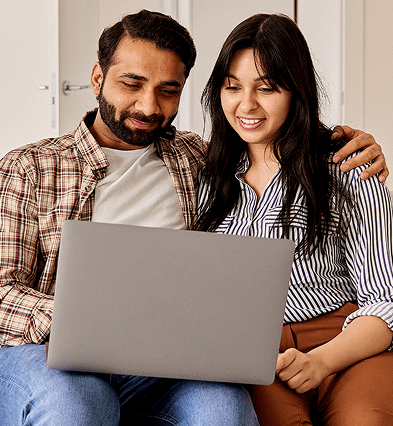 BEAD-PR-Header-Image-couple-looking-at-laptop